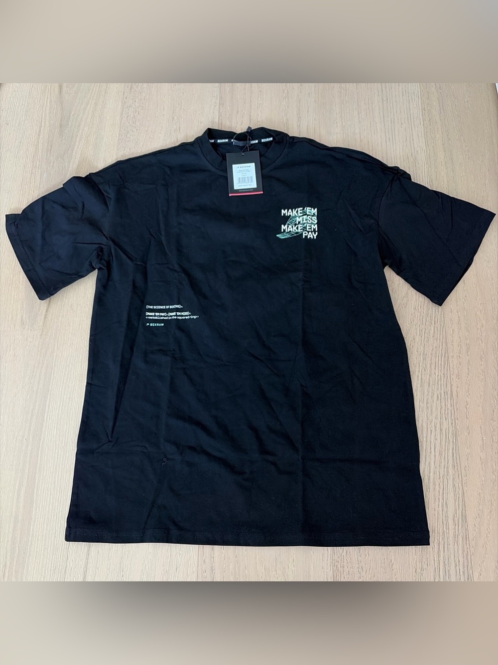 New Black Graphic Tee - Make 'Em Pay box raw